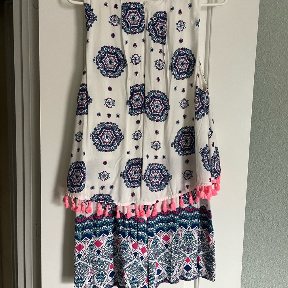White and pick and blue romper size XL